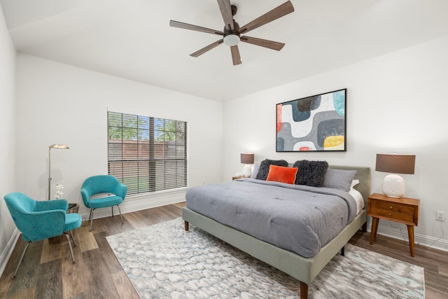 5106 Hardy St, Houston, TX 77009 - bedroom featuring baseboards, wood finished floors, and a ceiling fan