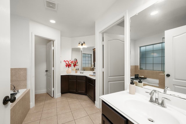 5106 Hardy St, Houston, TX 77009 - full bathroom featuring tile patterned flooring, a bath, vanity, and recessed lighting