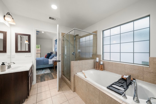5106 Hardy St, Houston, TX 77009 - ensuite bathroom with plenty of natural light, a shower stall, a garden tub, vanity, and recessed lighting