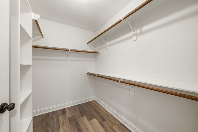 5106 Hardy St, Houston, TX 77009 - walk in closet featuring dark wood-style flooring