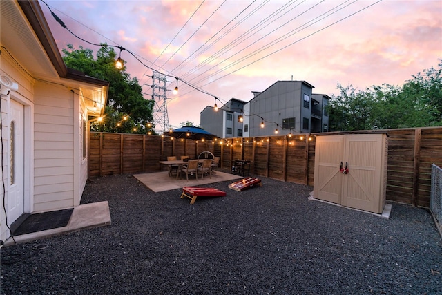 5106 Hardy St, Houston, TX 77009 - fenced backyard featuring outdoor dining space and a patio