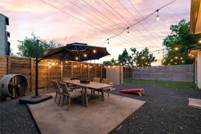 5106 Hardy St, Houston, TX 77009 - fenced backyard with a patio and outdoor dining area