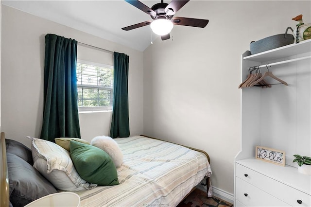 11433 Grassbur Rd, Bryan, TX 77808 - bedroom featuring a ceiling fan, lofted ceiling, and baseboards