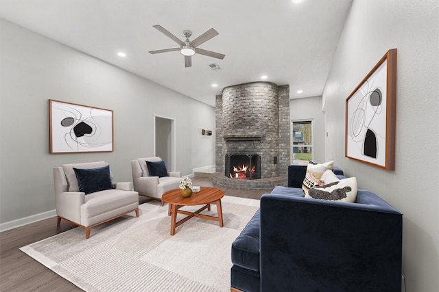2407 Rambling Brook Dr, Spring, TX 77373 - living area featuring a ceiling fan, a brick fireplace, wood finished floors, recessed lighting, and baseboards