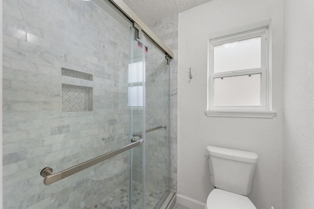 2407 Rambling Brook Dr, Spring, TX 77373 - bathroom featuring a stall shower and toilet