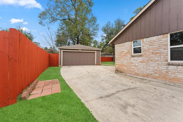 2407 Rambling Brook Dr, Spring, TX 77373 - garage with driveway and fence