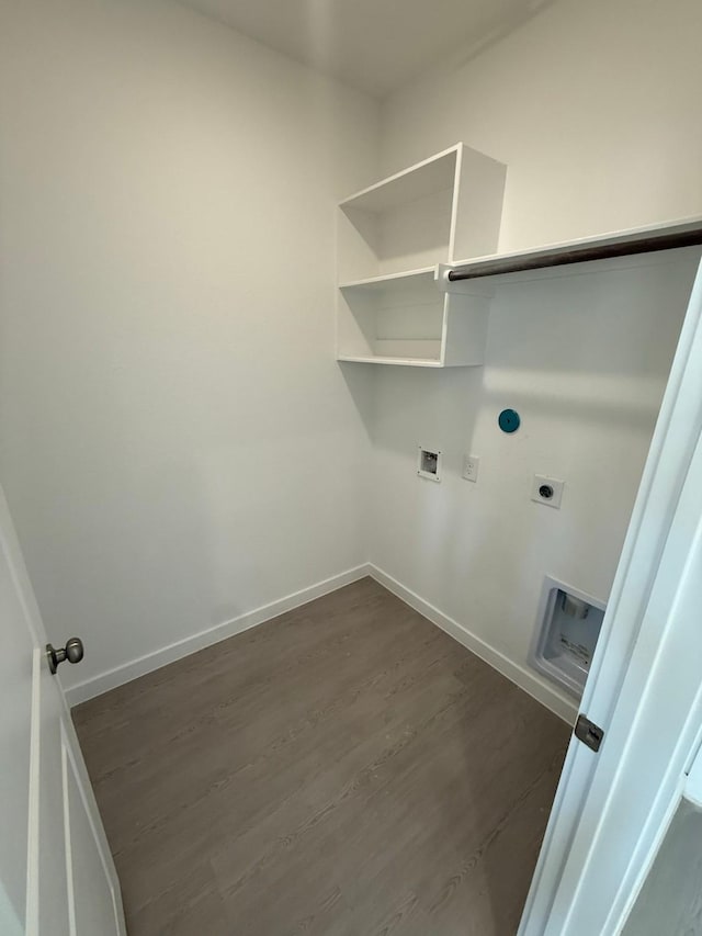 10300 Woodhill Spa Ln, Cleveland, TX 77327 - laundry area featuring hookup for an electric dryer, dark wood-style floors, baseboards, and washer hookup