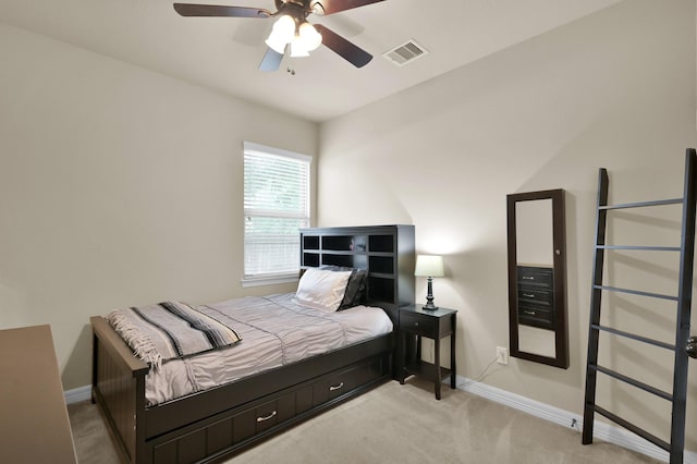 999 Arbor Xing, Conroe, TX 77303 - bedroom featuring light colored carpet, baseboards, and a ceiling fan