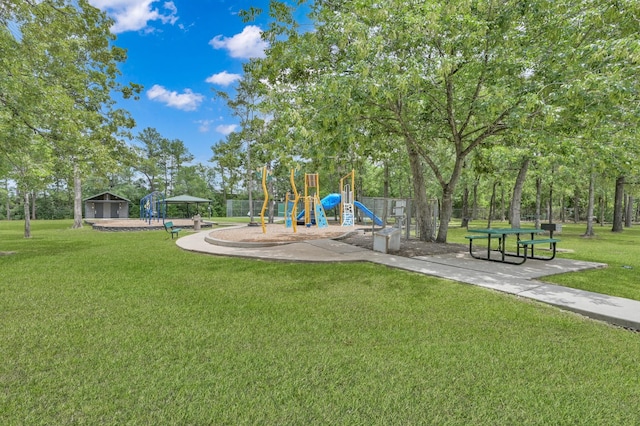 999 Arbor Xing, Conroe, TX 77303 - community play area with a lawn and a gazebo