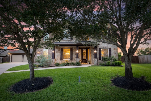 6871 Adrienne Arbor Dr, Spring, TX 77389 - view of front of house featuring stone siding, concrete driveway, and a garage
