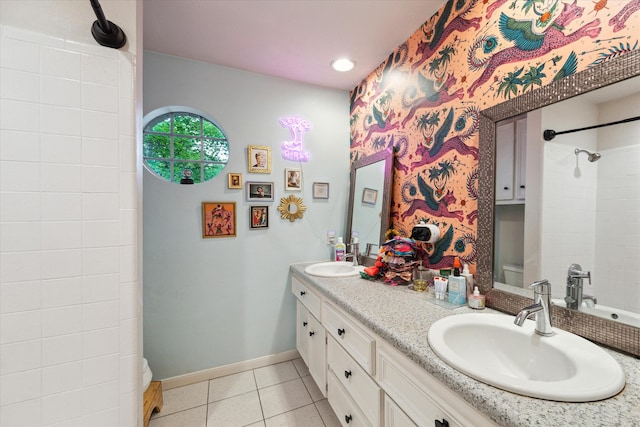 15907 Turtle Bay Dr, Houston, TX 77062 - full bath with baseboards, a shower, double vanity, tile patterned flooring, and recessed lighting