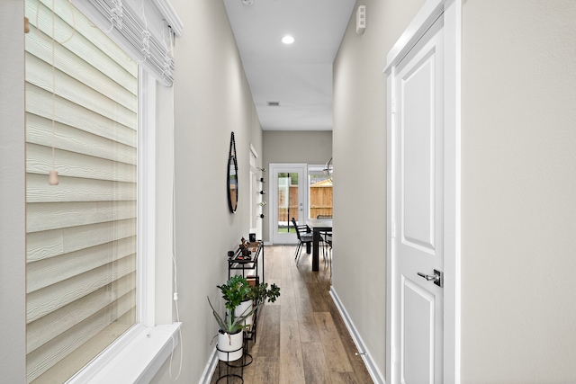 413 Stonework Oaks Ln, Houston, TX 77076 - hallway with wood finished floors, recessed lighting, and baseboards