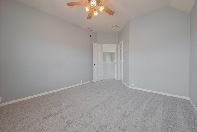 9205 Sunridge Ct, Pearland, TX 77584 - empty room with a ceiling fan, carpet floors, baseboards, and vaulted ceiling
