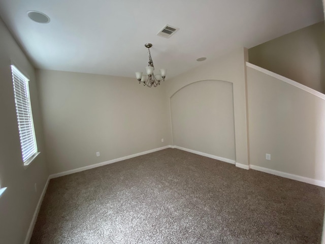 3603 Morgans Cove Ct, Katy, TX 77494 - spare room with a chandelier, healthy amount of natural light, carpet flooring, and baseboards