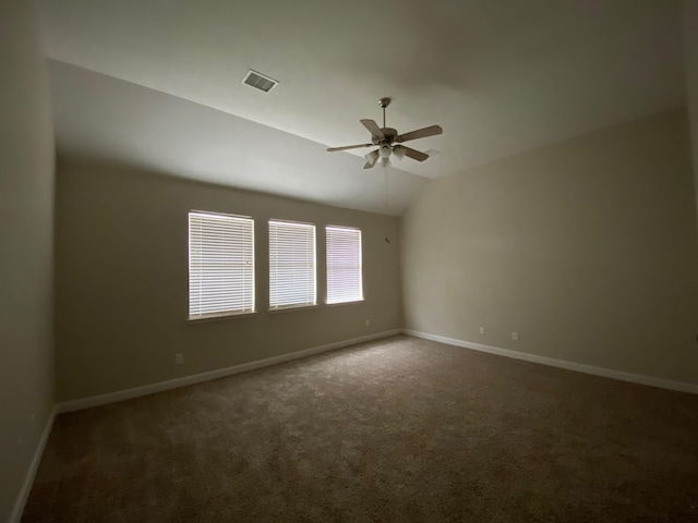 3603 Morgans Cove Ct, Katy, TX 77494 - empty room with carpet, a ceiling fan, baseboards, and vaulted ceiling