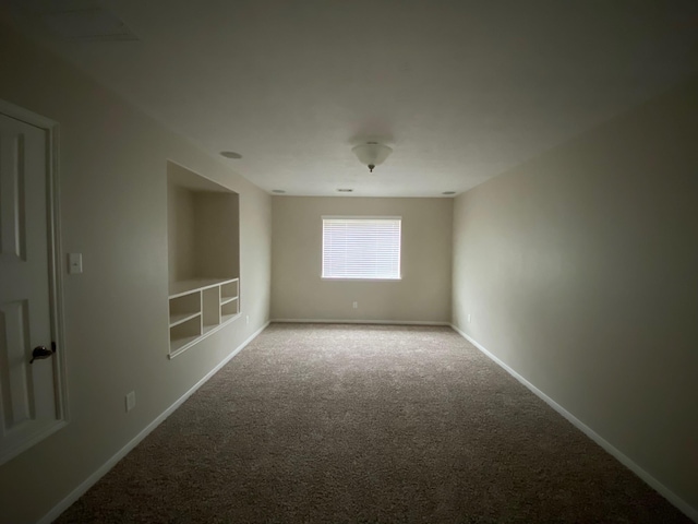 3603 Morgans Cove Ct, Katy, TX 77494 - spare room featuring carpet floors and baseboards