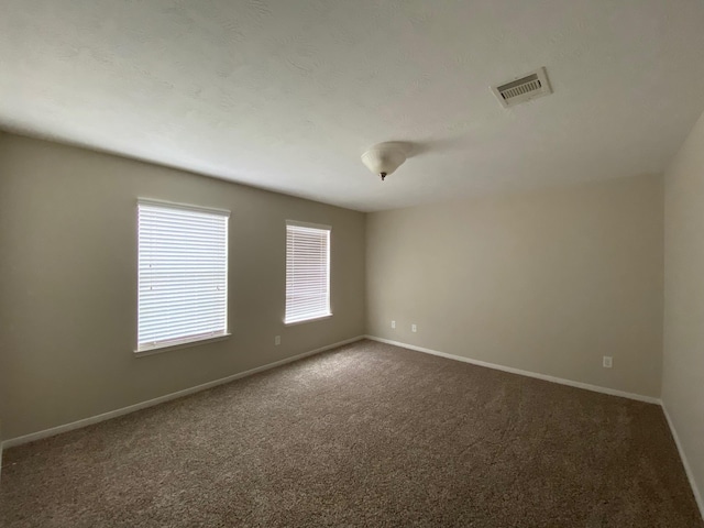 3603 Morgans Cove Ct, Katy, TX 77494 - unfurnished room featuring dark colored carpet and baseboards