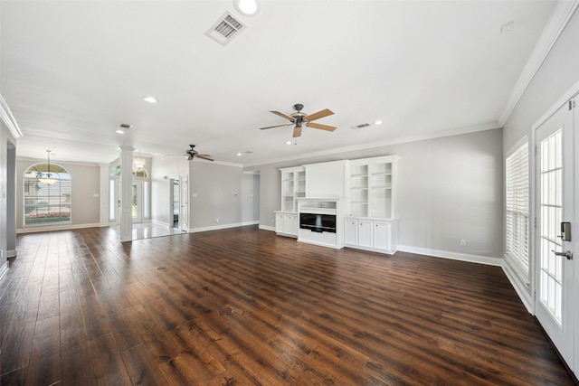 5224 Shorewood Dr, Willis, TX 77318 - unfurnished living room featuring a ceiling fan, baseboards, crown molding, a fireplace, and dark wood finished floors