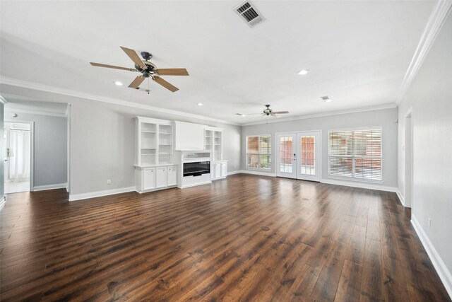5224 Shorewood Dr, Willis, TX 77318 - unfurnished living room with ceiling fan, baseboards, crown molding, dark wood-type flooring, and recessed lighting