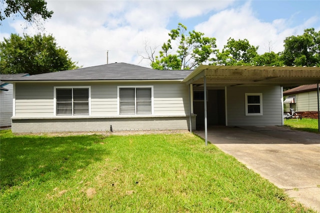 8130 Sharondale Dr, Houston, TX 77033 - ranch-style house with concrete driveway, brick siding, a front lawn, and a carport