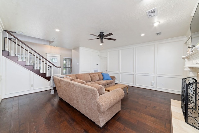 14926 Royal Birkdale St, Houston, TX 77095 - living room featuring a decorative wall, dark wood finished floors, ceiling fan, stairway, and recessed lighting