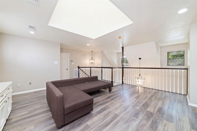14926 Royal Birkdale St, Houston, TX 77095 - living area with plenty of natural light, light wood-style floors, baseboards, and recessed lighting
