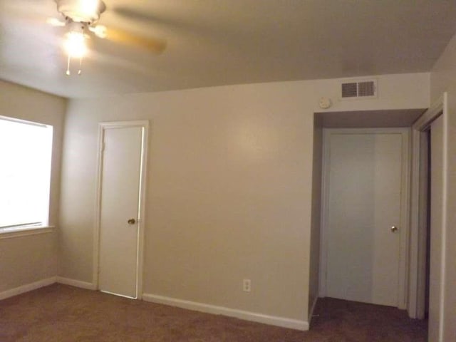 3114 Falk Ct Unit 3114, La Porte, TX 77571 - carpeted spare room featuring baseboards and a ceiling fan