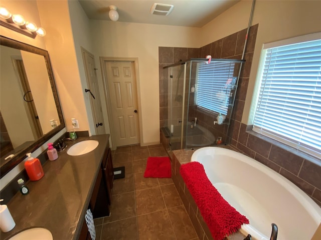 15 S Marshside Pl, Spring, TX 77389 - bathroom featuring a shower stall, a bath, vanity, and tile patterned floors