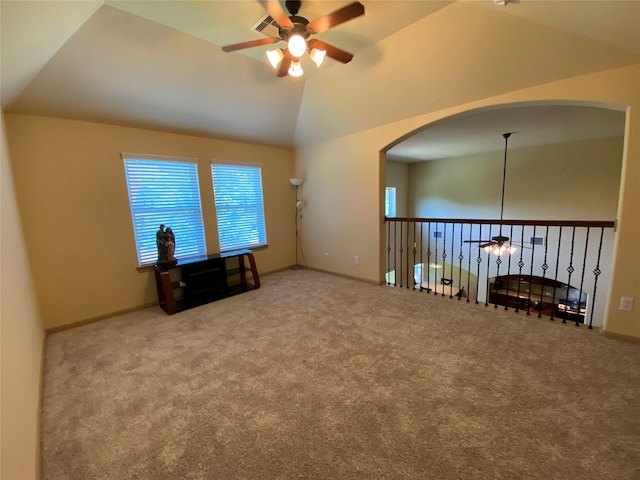 15 S Marshside Pl, Spring, TX 77389 - spare room with a ceiling fan, vaulted ceiling, and carpet