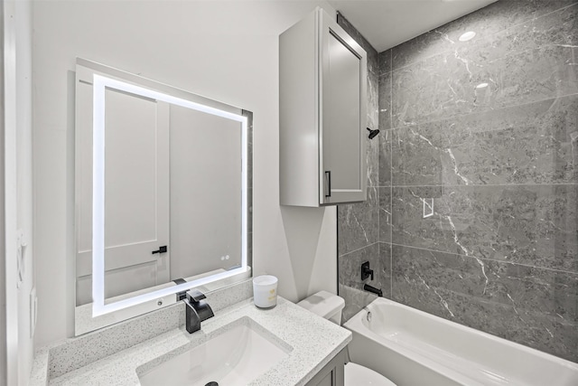 316 E Oakdale St, Dayton, TX 77535 - bathroom featuring vanity, toilet, and shower / tub combination