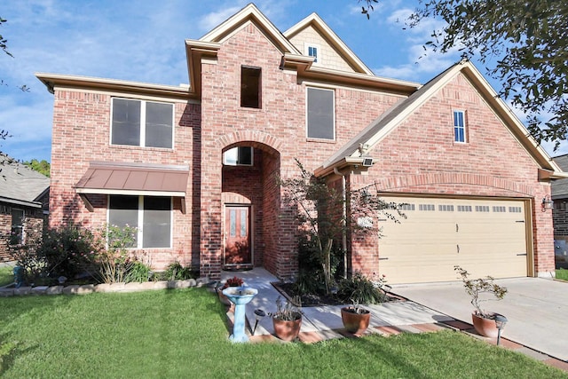 14542 Northern Mountain Ct, Houston, TX 77090 - view of front of property with brick siding, concrete driveway, a front yard, and an attached garage