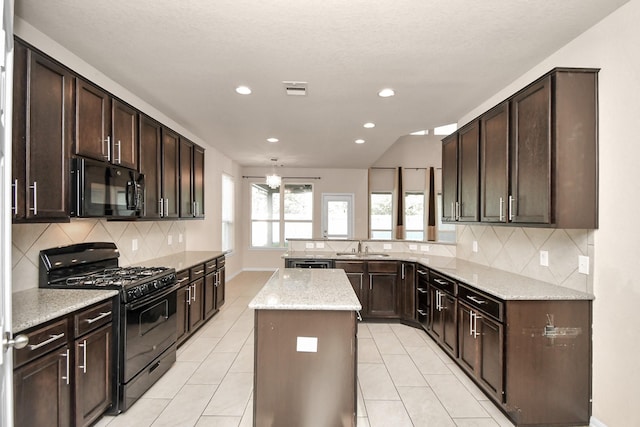 14542 Northern Mountain Ct, Houston, TX 77090 - kitchen featuring black appliances, a sink, a peninsula, decorative backsplash, and dark brown cabinetry