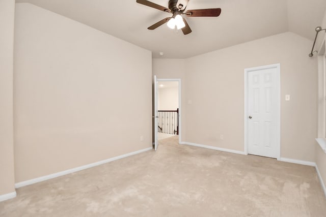 14542 Northern Mountain Ct, Houston, TX 77090 - unfurnished bedroom featuring light colored carpet, baseboards, vaulted ceiling, and ceiling fan