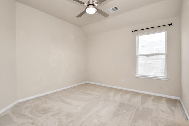 14542 Northern Mountain Ct, Houston, TX 77090 - unfurnished room featuring light carpet, baseboards, ceiling fan, and vaulted ceiling