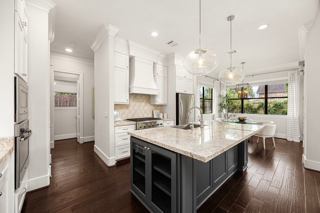 1211 Chamboard Ln, Houston, TX 77018 - kitchen featuring custom exhaust hood, baseboards, stainless steel appliances, a sink, and white cabinets