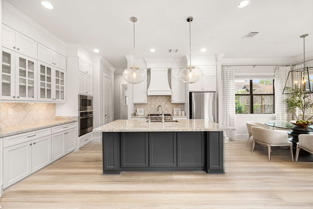 1211 Chamboard Ln, Houston, TX 77018 - kitchen with appliances with stainless steel finishes, custom exhaust hood, white cabinetry, ornamental molding, and recessed lighting