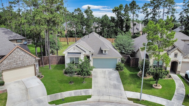 12407 Palo Acebo Ln, Humble, TX 77346 - view of front of house featuring driveway