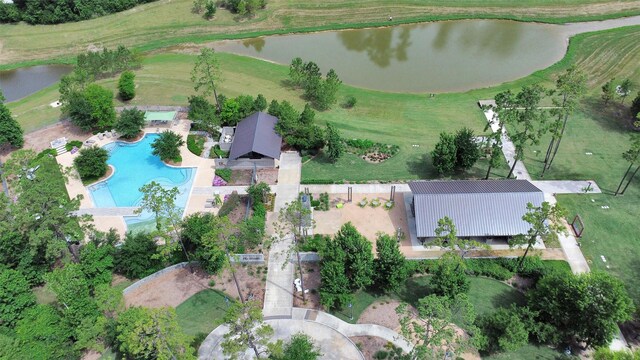 12407 Palo Acebo Ln, Humble, TX 77346 - aerial view of property's location with a large body of water, a pool, and a local golf course