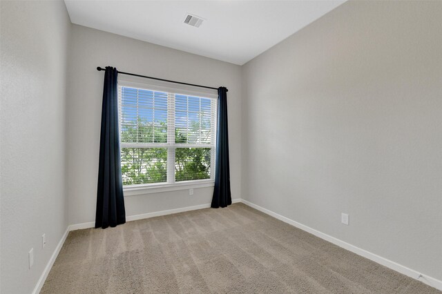 12407 Palo Acebo Ln, Humble, TX 77346 - unfurnished room with carpet and baseboards