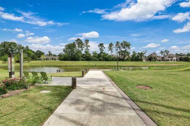 12407 Palo Acebo Ln, Humble, TX 77346 - surrounding community featuring a water view and a yard