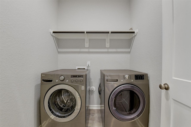 12407 Palo Acebo Ln, Humble, TX 77346 - laundry area featuring washer and clothes dryer