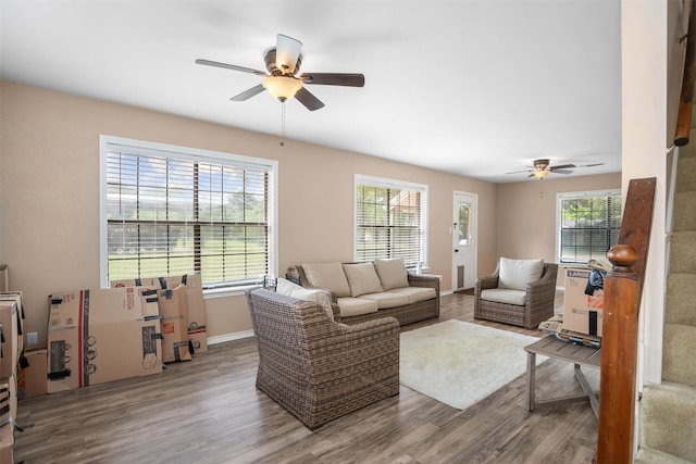 416 State Highway 21 E, Crockett, TX 75835 - living area featuring a ceiling fan, wood finished floors, and baseboards