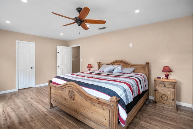 416 State Highway 21 E, Crockett, TX 75835 - bedroom featuring baseboards, wood finished floors, recessed lighting, and ceiling fan
