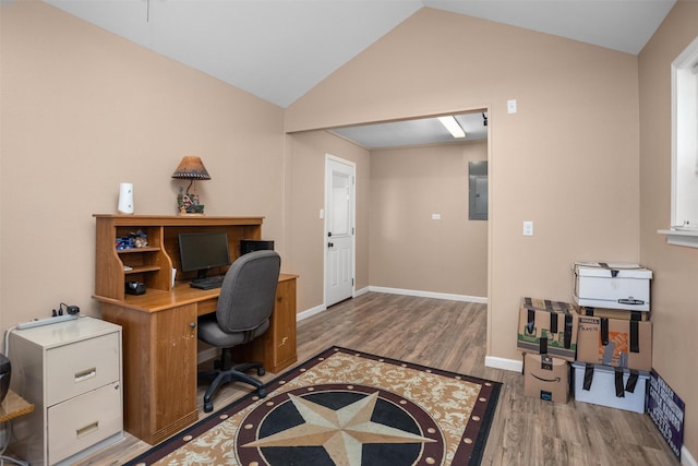 416 State Highway 21 E, Crockett, TX 75835 - office featuring wood finished floors, lofted ceiling, electric panel, and baseboards