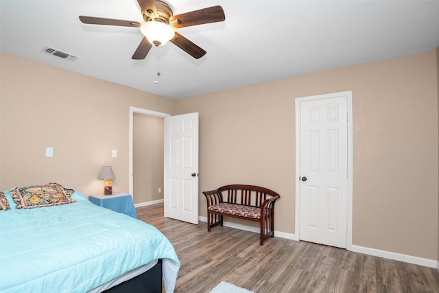 416 State Highway 21 E, Crockett, TX 75835 - bedroom featuring light wood-style flooring, baseboards, and a ceiling fan