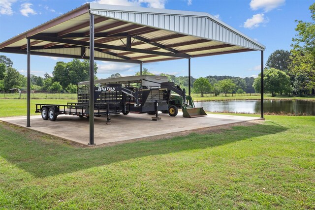 416 State Highway 21 E, Crockett, TX 75835 - view of community featuring a carport, a lawn, and a water view