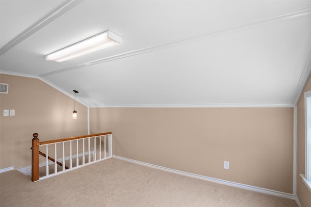 416 State Highway 21 E, Crockett, TX 75835 - additional living space with vaulted ceiling, carpet floors, and baseboards