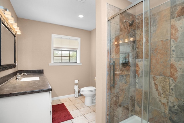 416 State Highway 21 E, Crockett, TX 75835 - bathroom featuring toilet, a stall shower, baseboards, tile patterned floors, and vanity