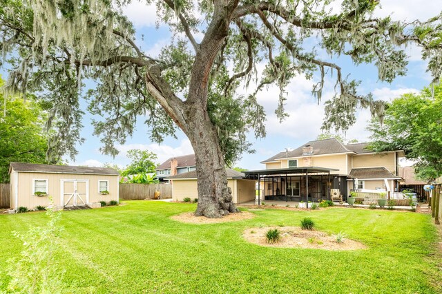 333 Banyan Dr, Lake Jackson, TX 77566 - view of yard featuring a sunroom