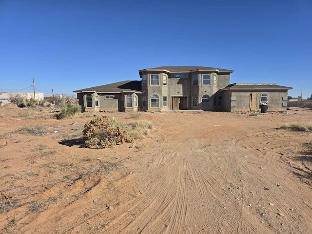 14026 Bradley Rd, Clint, TX 79938 - rear view of house with stucco siding